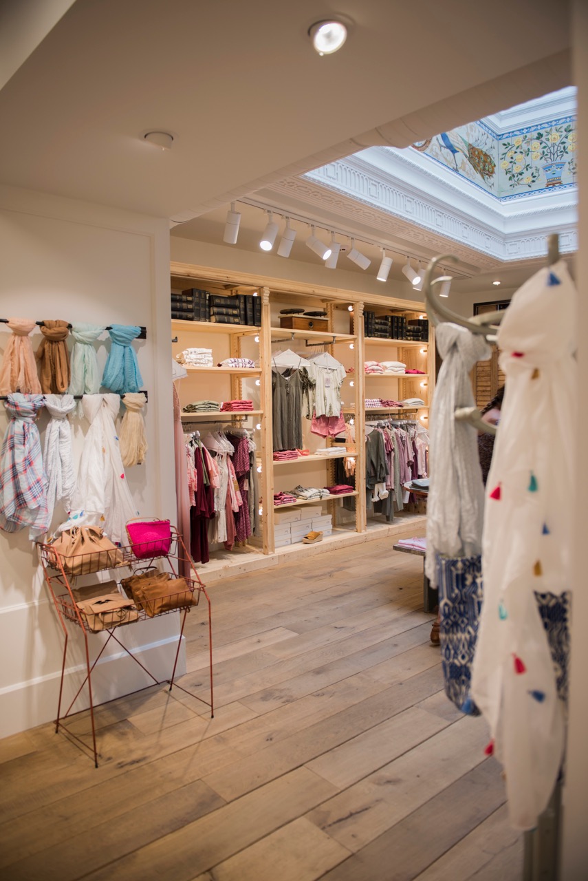 Solid wood flooring in the interior of a fashion retail premises