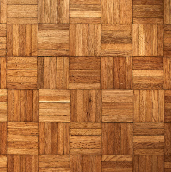 Instalación de parquet formato damero en Barcelona.